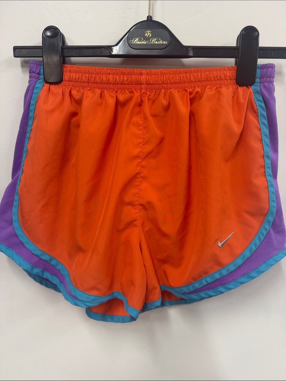 Nike Women’s Orange Athletic Shorts with Purple & Teal Trim